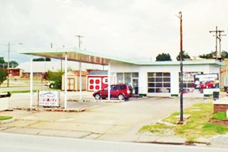 canopy, office and garage of a 1960s filling station