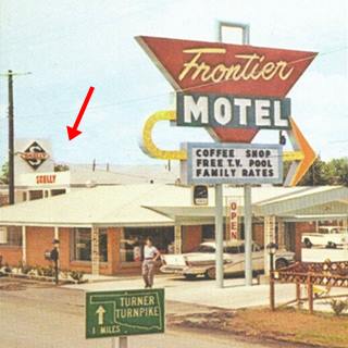 Motel and Skelly gas station 1950s Tulsa Rte 66 red arrow marks Skelly gas station to the left of a motel neon sign