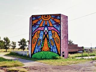 artwork Guardian of the Mother Road mural Squaw Drive In El Reno A mural on a drive in wall