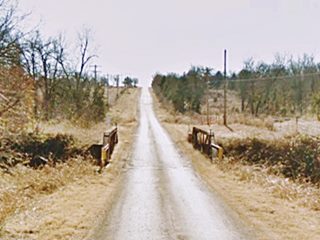 Bridge on 1926-30 US 66 alignment Route 66 into Stroud steel bridge on narrow highway
