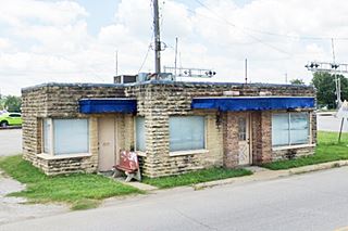 1940 WPA building on US66 Claremore stone building, flat roof facing highway