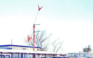 Arrow sign Route 66 arrow sign at auto dealer