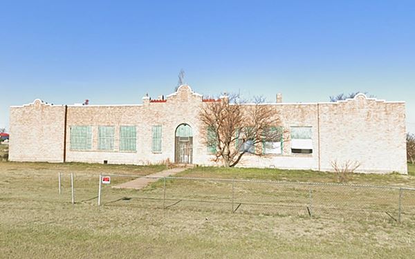 color photo of school in Conway a brick one story building