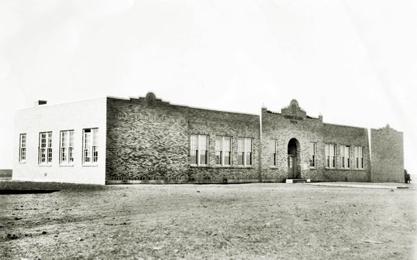 1931 black and white photo of brick one story building
