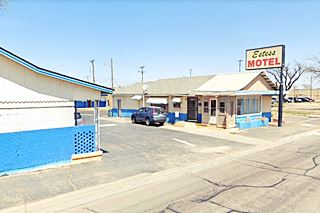 Estess Motel motel nowadays motel office with neon sign facing Route 66