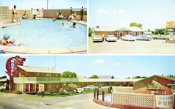 color postacard from 1960 of a motel with gabled roof, 2 story office and neon sign