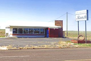 one floor building, a restaurant with its neon sign Ranch Cafe Groom, Route 66