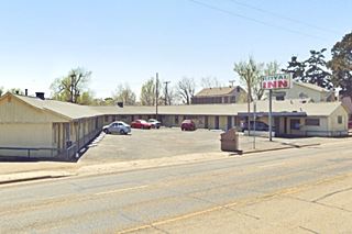 Royal Inn Motel nowadays gable roofed L shaped motel on Route 66