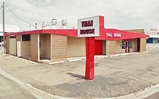 Ruth’s is now a Thai Restaurant Restaurant facade and neon sign